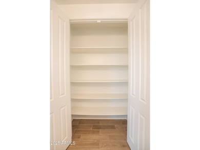 LOWEST-PRICED HOME IN THE AREA! Discover elevated desert living on Verrado Golf Club  in Arizona - for sale on GolfHomes.com, golf home, golf lot