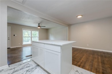 This home qualifies for up to $15,000 in grants--no income on Browns Mill Golf Course in Georgia - for sale on GolfHomes.com, golf home, golf lot