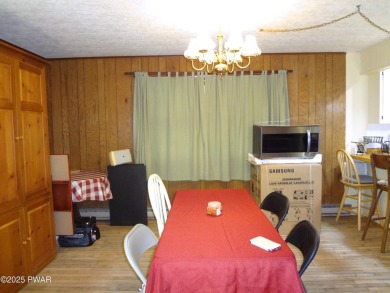 LARGE LAKE WALLENPAUPACK HOME WITH GOLF COURSE VIEWS IN on Paupack Hills Golf and Country Club in Pennsylvania - for sale on GolfHomes.com, golf home, golf lot