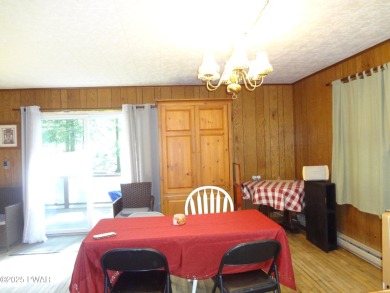 LARGE LAKE WALLENPAUPACK HOME WITH GOLF COURSE VIEWS IN on Paupack Hills Golf and Country Club in Pennsylvania - for sale on GolfHomes.com, golf home, golf lot