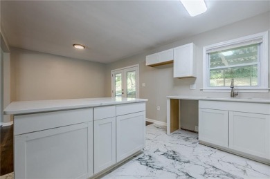 This home qualifies for up to $15,000 in grants--no income on Browns Mill Golf Course in Georgia - for sale on GolfHomes.com, golf home, golf lot