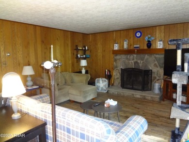 LARGE LAKE WALLENPAUPACK HOME WITH GOLF COURSE VIEWS IN on Paupack Hills Golf and Country Club in Pennsylvania - for sale on GolfHomes.com, golf home, golf lot