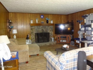 LARGE LAKE WALLENPAUPACK HOME WITH GOLF COURSE VIEWS IN on Paupack Hills Golf and Country Club in Pennsylvania - for sale on GolfHomes.com, golf home, golf lot
