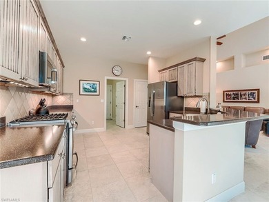 Whether scaling down from a larger custom home or moving-up from on Shadow Wood Country Club in Florida - for sale on GolfHomes.com, golf home, golf lot