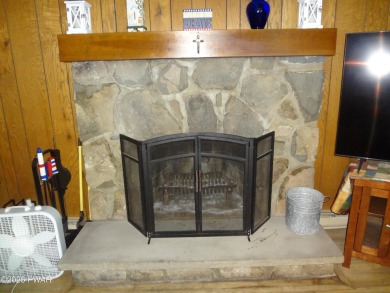 LARGE LAKE WALLENPAUPACK HOME WITH GOLF COURSE VIEWS IN on Paupack Hills Golf and Country Club in Pennsylvania - for sale on GolfHomes.com, golf home, golf lot