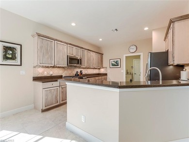 Whether scaling down from a larger custom home or moving-up from on Shadow Wood Country Club in Florida - for sale on GolfHomes.com, golf home, golf lot