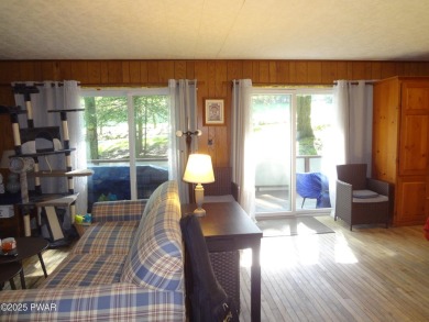 LARGE LAKE WALLENPAUPACK HOME WITH GOLF COURSE VIEWS IN on Paupack Hills Golf and Country Club in Pennsylvania - for sale on GolfHomes.com, golf home, golf lot
