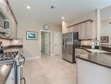 Whether scaling down from a larger custom home or moving-up from on Shadow Wood Country Club in Florida - for sale on GolfHomes.com, golf home, golf lot