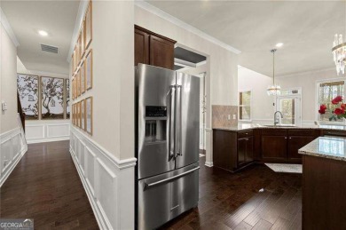 Welcome to 404 Prague Way, an exquisite residence nestled in the on Crystal Lake Golf and Country Club in Georgia - for sale on GolfHomes.com, golf home, golf lot
