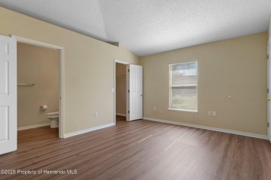 NEW PRICE!! Welcome to your home in the heart of Spring Hill on Timber Pines Golf Course in Florida - for sale on GolfHomes.com, golf home, golf lot