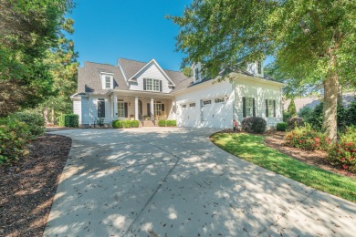 This beautiful home overlooks the Cupp  Course  fairway on Woodside Plantation Country Club in South Carolina - for sale on GolfHomes.com, golf home, golf lot