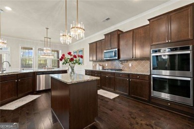 Welcome to 404 Prague Way, an exquisite residence nestled in the on Crystal Lake Golf and Country Club in Georgia - for sale on GolfHomes.com, golf home, golf lot