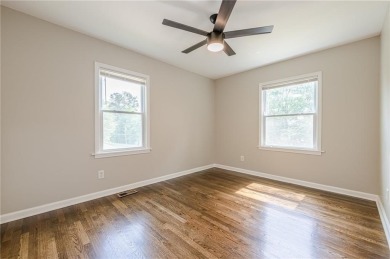 This home qualifies for up to $15,000 in grants--no income on Browns Mill Golf Course in Georgia - for sale on GolfHomes.com, golf home, golf lot