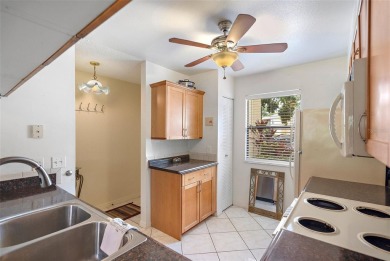 This highly desirable 2//2 bath, first floor CORNER END UNIT is on St. Petersburg Country Club in Florida - for sale on GolfHomes.com, golf home, golf lot