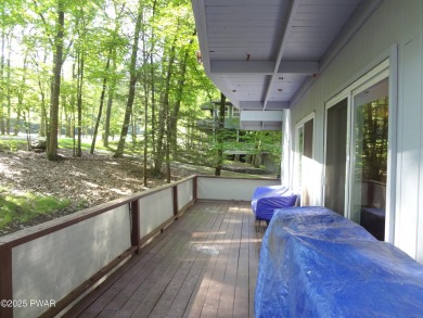 LARGE LAKE WALLENPAUPACK HOME WITH GOLF COURSE VIEWS IN on Paupack Hills Golf and Country Club in Pennsylvania - for sale on GolfHomes.com, golf home, golf lot