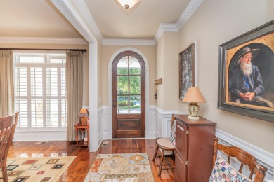 This beautiful home overlooks the Cupp  Course  fairway on Woodside Plantation Country Club in South Carolina - for sale on GolfHomes.com, golf home, golf lot
