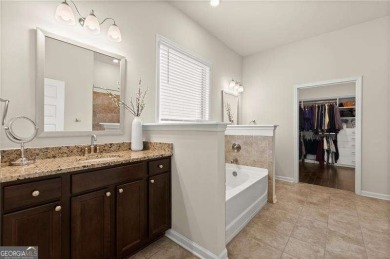 Welcome to 404 Prague Way, an exquisite residence nestled in the on Crystal Lake Golf and Country Club in Georgia - for sale on GolfHomes.com, golf home, golf lot