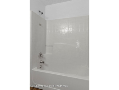 NEW PRICE!! Welcome to your home in the heart of Spring Hill on Timber Pines Golf Course in Florida - for sale on GolfHomes.com, golf home, golf lot