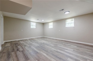 This home qualifies for up to $15,000 in grants--no income on Browns Mill Golf Course in Georgia - for sale on GolfHomes.com, golf home, golf lot