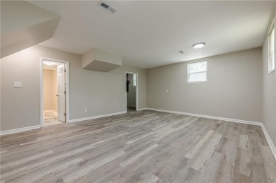 This home qualifies for up to $15,000 in grants--no income on Browns Mill Golf Course in Georgia - for sale on GolfHomes.com, golf home, golf lot