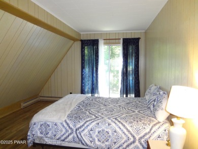 LARGE LAKE WALLENPAUPACK HOME WITH GOLF COURSE VIEWS IN on Paupack Hills Golf and Country Club in Pennsylvania - for sale on GolfHomes.com, golf home, golf lot