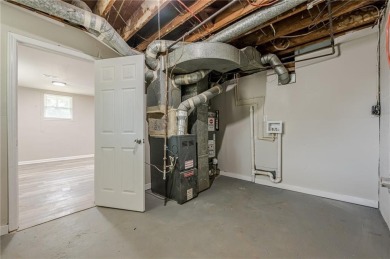 This home qualifies for up to $15,000 in grants--no income on Browns Mill Golf Course in Georgia - for sale on GolfHomes.com, golf home, golf lot