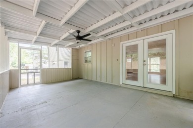 This home qualifies for up to $15,000 in grants--no income on Browns Mill Golf Course in Georgia - for sale on GolfHomes.com, golf home, golf lot