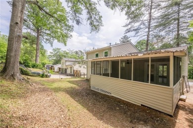 This home qualifies for up to $15,000 in grants--no income on Browns Mill Golf Course in Georgia - for sale on GolfHomes.com, golf home, golf lot