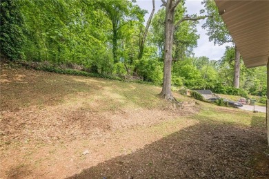 This home qualifies for up to $15,000 in grants--no income on Browns Mill Golf Course in Georgia - for sale on GolfHomes.com, golf home, golf lot
