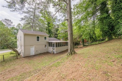This home qualifies for up to $15,000 in grants--no income on Browns Mill Golf Course in Georgia - for sale on GolfHomes.com, golf home, golf lot