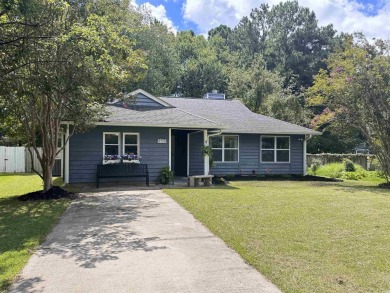 Discover your coastal haven in the tranquil Kings Grant on Indigo Creek Golf Club in South Carolina - for sale on GolfHomes.com, golf home, golf lot