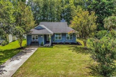 Discover your coastal haven in the tranquil Kings Grant on Indigo Creek Golf Club in South Carolina - for sale on GolfHomes.com, golf home, golf lot