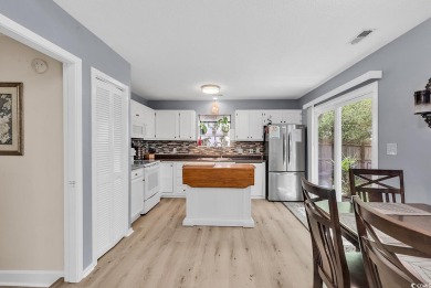 Discover your coastal haven in the tranquil Kings Grant on Indigo Creek Golf Club in South Carolina - for sale on GolfHomes.com, golf home, golf lot