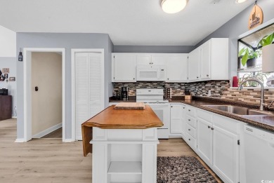 Discover your coastal haven in the tranquil Kings Grant on Indigo Creek Golf Club in South Carolina - for sale on GolfHomes.com, golf home, golf lot