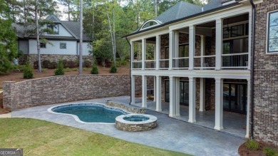 Another enviable custom golf estate built by Walden Signature on Reynolds Lake Oconee - The Oconee in Georgia - for sale on GolfHomes.com, golf home, golf lot