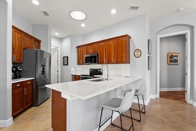 Experience elevated Florida living in this elegant villa-style on DeBary Golf and Country Club in Florida - for sale on GolfHomes.com, golf home, golf lot