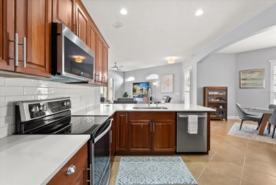 Experience elevated Florida living in this elegant villa-style on DeBary Golf and Country Club in Florida - for sale on GolfHomes.com, golf home, golf lot