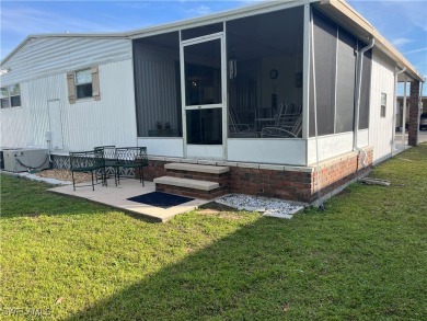 BEAUTIFUL HOME in Phase 3 of the much Desired Tamiami Villagee & on Six Lakes Country Club in Florida - for sale on GolfHomes.com, golf home, golf lot