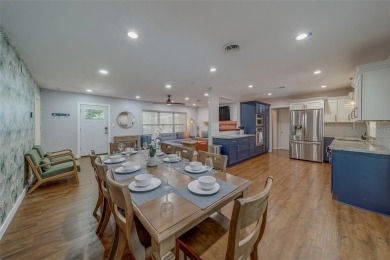 Under contract-accepting backup offers. Stunning Modern Pool on Clearwater Country Club in Florida - for sale on GolfHomes.com, golf home, golf lot
