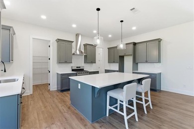 Welcome to the Littleson Plan at Carter Grove - where timeless on The Plantation Golf Club in Georgia - for sale on GolfHomes.com, golf home, golf lot