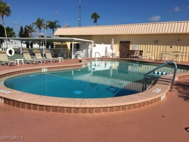 BEAUTIFUL HOME in Phase 3 of the much Desired Tamiami Villagee & on Six Lakes Country Club in Florida - for sale on GolfHomes.com, golf home, golf lot