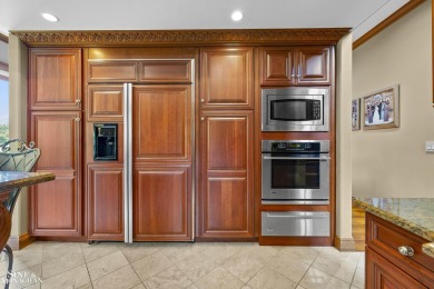 Truly an extraordinary custom residence, perfectly positioned on on St Clair River Country Club in Michigan - for sale on GolfHomes.com, golf home, golf lot