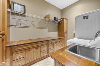Truly an extraordinary custom residence, perfectly positioned on on St Clair River Country Club in Michigan - for sale on GolfHomes.com, golf home, golf lot