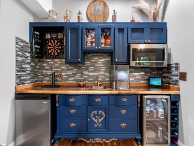 Discover a residence where timeless quality meets refined design on The Cliffs Valley Golf Course in South Carolina - for sale on GolfHomes.com, golf home, golf lot