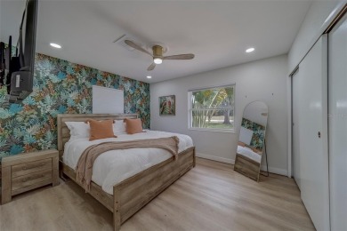 Under contract-accepting backup offers. Stunning Modern Pool on Clearwater Country Club in Florida - for sale on GolfHomes.com, golf home, golf lot