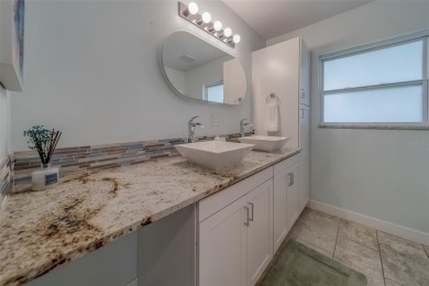 Under contract-accepting backup offers. Stunning Modern Pool on Clearwater Country Club in Florida - for sale on GolfHomes.com, golf home, golf lot
