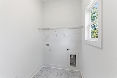 Welcome to the Littleson Plan at Carter Grove - where timeless on The Plantation Golf Club in Georgia - for sale on GolfHomes.com, golf home, golf lot