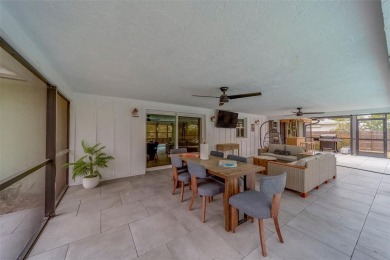Under contract-accepting backup offers. Stunning Modern Pool on Clearwater Country Club in Florida - for sale on GolfHomes.com, golf home, golf lot