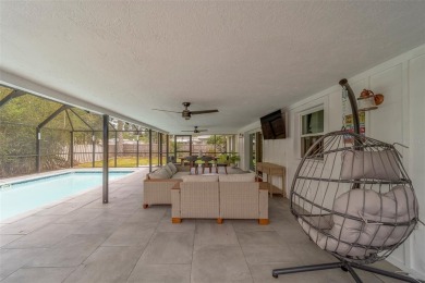 Under contract-accepting backup offers. Stunning Modern Pool on Clearwater Country Club in Florida - for sale on GolfHomes.com, golf home, golf lot