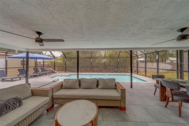 Under contract-accepting backup offers. Stunning Modern Pool on Clearwater Country Club in Florida - for sale on GolfHomes.com, golf home, golf lot